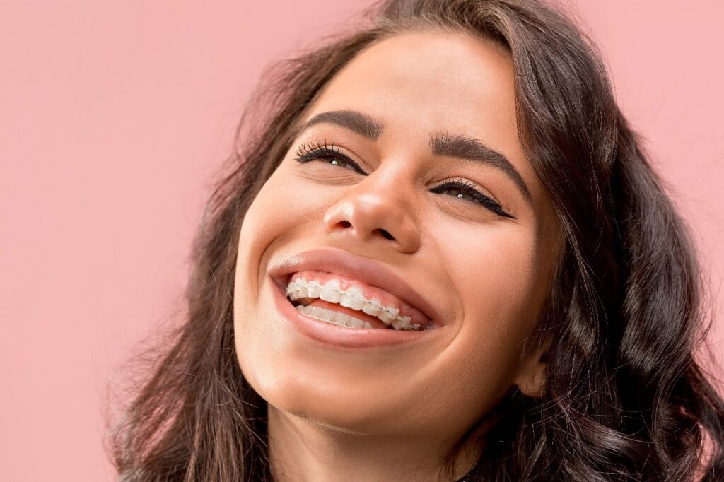 person with braces smiling 