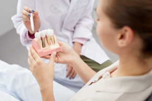 Dentist explaining the dental implant process to patient